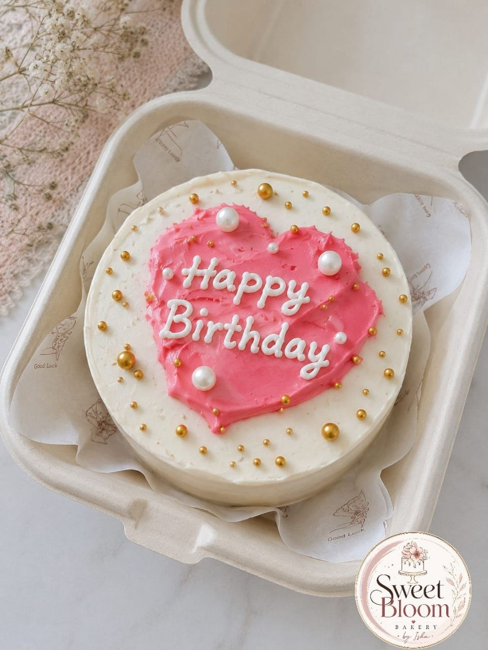 Pink heart bento birthday cake with gold and pearl sprinkles in a kraft box — Sweet Bloom Bakery, Asansol